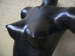 Female, black, sitting, piece no. 2. Partial.