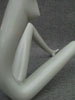 Female, white, sitting, piece no. 1. Partial.