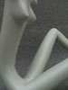 Female, white, sitting, piece no. 1. Partial.