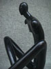 Male, black, sitting, piece no. 1
