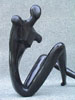 Male, black, sitting, piece no. 1