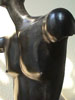 Male, black, sitting, piece no. 1